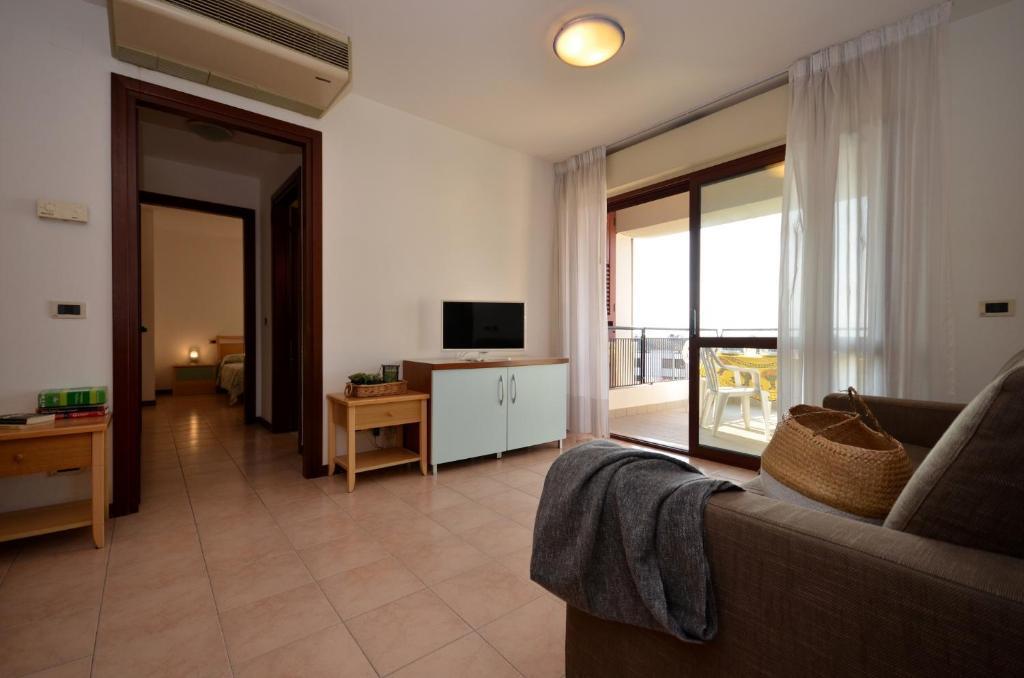 Residenza Porta Del Mare Apartment Линяно Сабиадоро Екстериор снимка